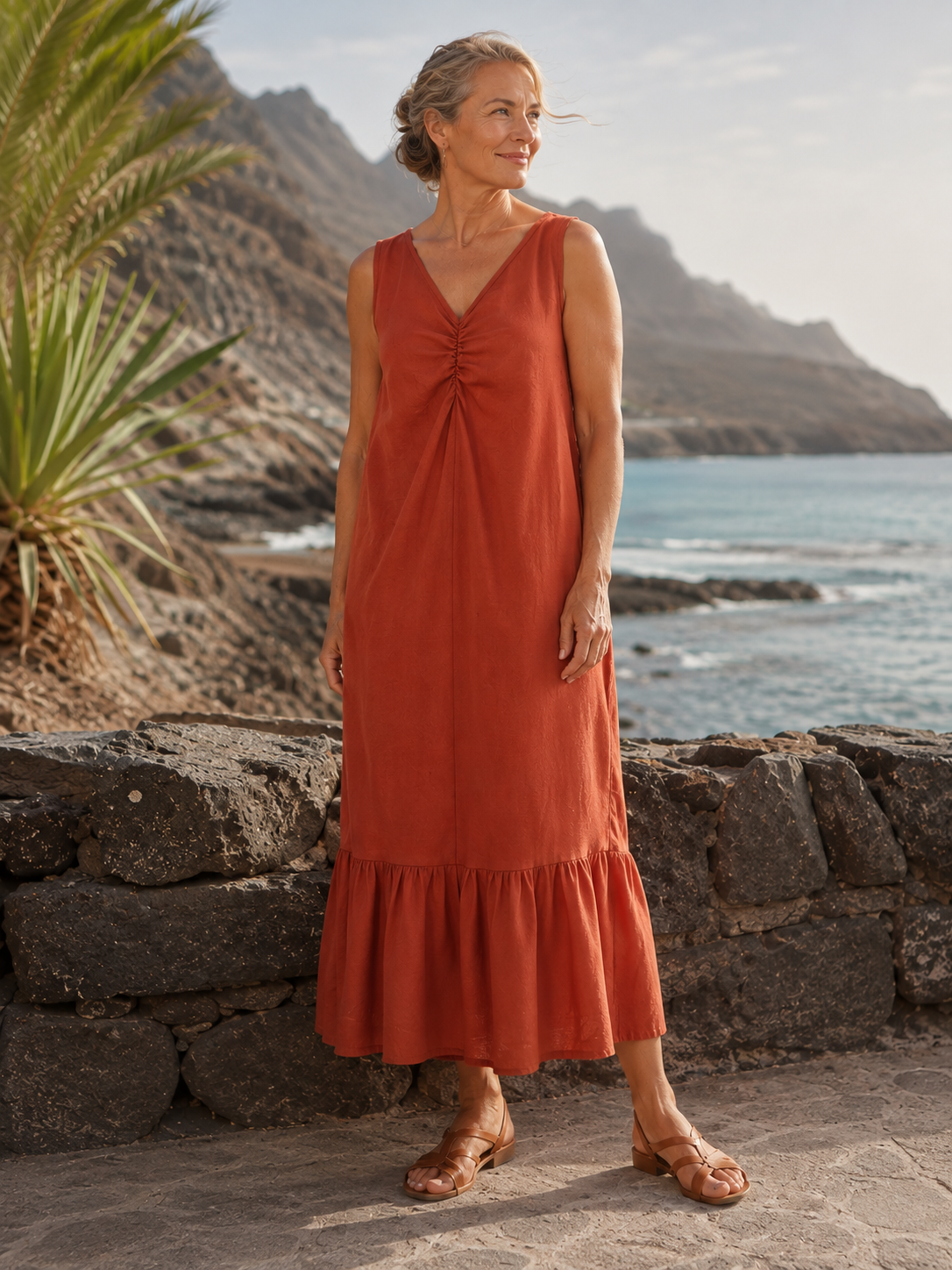 Vestido Brezo color terracota de frente, vestido largo de tencel, algodón y lino con escote elástico.